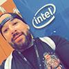 Kevin Chavez in front of the Intel signage